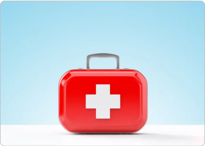 red medical briefcase on white surface